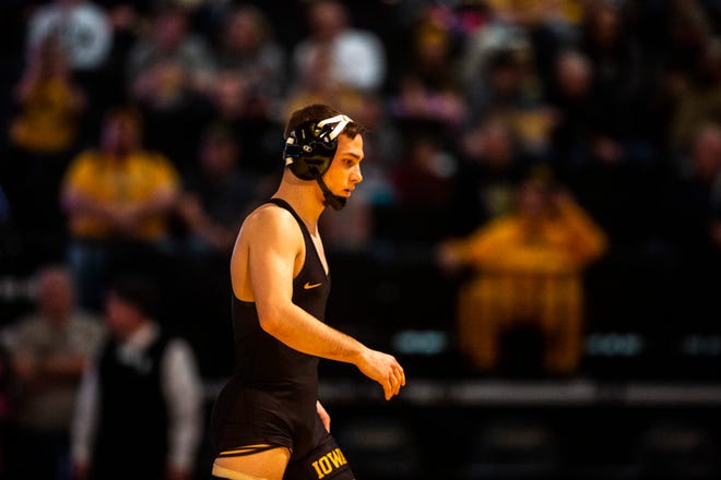 Iowa's Spencer Lee is introduced before his match at 125 pounds during a NCAA non-conference wrestling dual, Sunday, Nov., 17, 2019, at Carver-Hawkeye Arena in Iowa City, Iowa.