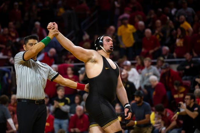 Iowa's Tony Cassioppi wins his match agasint Iowa State's Gannon Gremmel at 285 during the Cy-Hawk dual on Sunday, Nov. 17, 2019, in Hilton Coliseum.