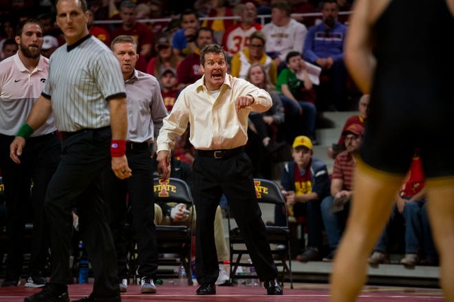 Iowa Head Coach Tom Brands calls out to one of his wrestlers during the Cy-Hawk dual on Sunday, Nov. 17, 2019, in Hilton Coliseum.