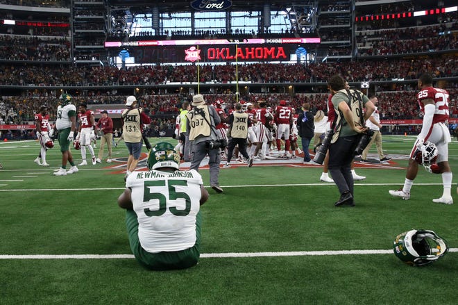 Baylor Bears offensive lineman Xavier Newman (55) reacts after the loss to the Oklahoma Sooners in the Big 12 Conference championship game.