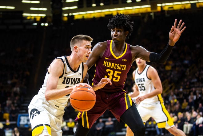 Iowa guard Joe Wieskamp (10) drives to the basket against Minnesota's Isaiah Ihnen (35) during a NCAA Big Ten Conference men's basketball game, Monday, Dec. 9, 2019, at Carver-Hawkeye Arena in Iowa City, Iowa.
