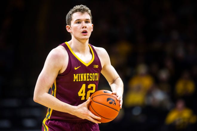 Minnesota's Michael Hurt (42) takes the ball up court during a NCAA Big Ten Conference men's basketball game, Monday, Dec. 9, 2019, at Carver-Hawkeye Arena in Iowa City, Iowa.