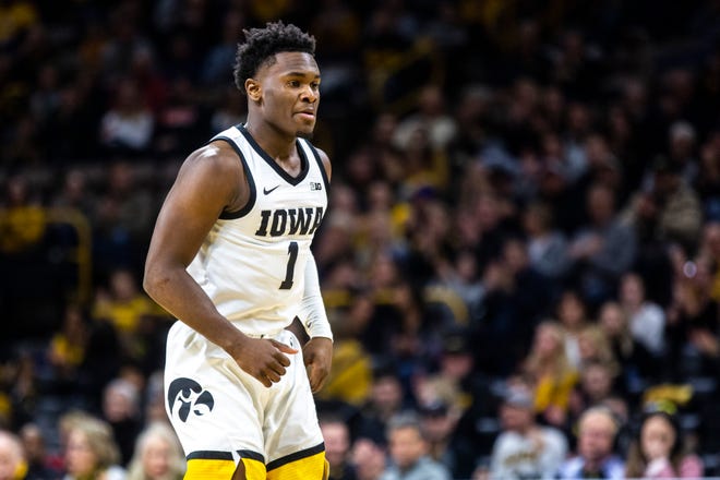 Iowa guard Joe Toussaint (1) reacts after making a basket during a NCAA Big Ten Conference men's basketball game, Monday, Dec. 9, 2019, at Carver-Hawkeye Arena in Iowa City, Iowa.