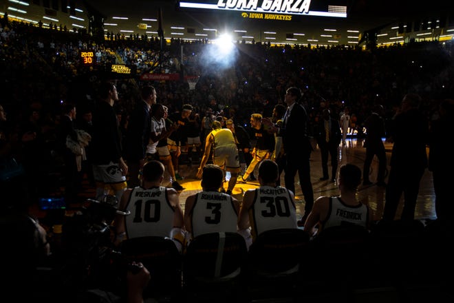 Iowa center Luka Garza (55) is introduced during a NCAA Big Ten Conference men's basketball game, Monday, Dec. 9, 2019, at Carver-Hawkeye Arena in Iowa City, Iowa.