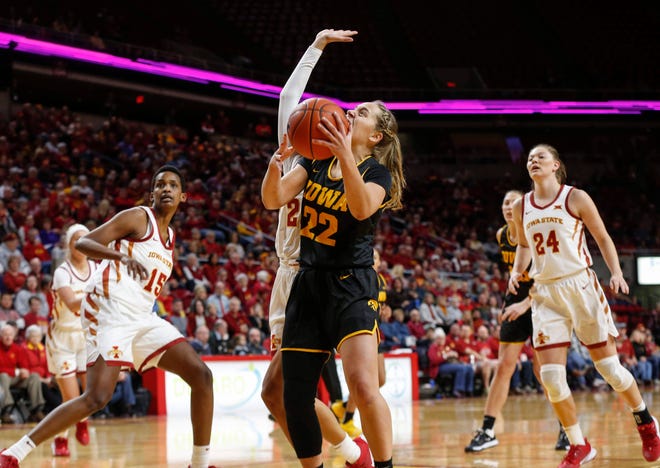 Iowa senior Kathleen Doyle drives to the basket against Iowa State in the first quarter during the CyHawk Series women's basketball game on Wednesday, Dec. 11, 2019, at Hilton Coliseum in Ames, Iowa.