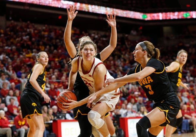 Iowa State sophomore Ashley Joens maintains control of the ball as she drives in against Iowa during the CyHawk Series women's basketball game on Wednesday, Dec. 11, 2019, at Hilton Coliseum in Ames, Iowa.