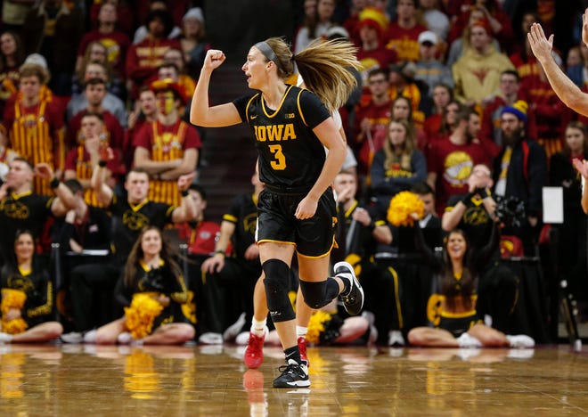 Iowa senior Makenzie Meyer reacts after drilling a three-point field goal against Iowa State in the fourth quarter during the CyHawk Series women's basketball game on Wednesday, Dec. 11, 2019, at Hilton Coliseum in Ames, Iowa.