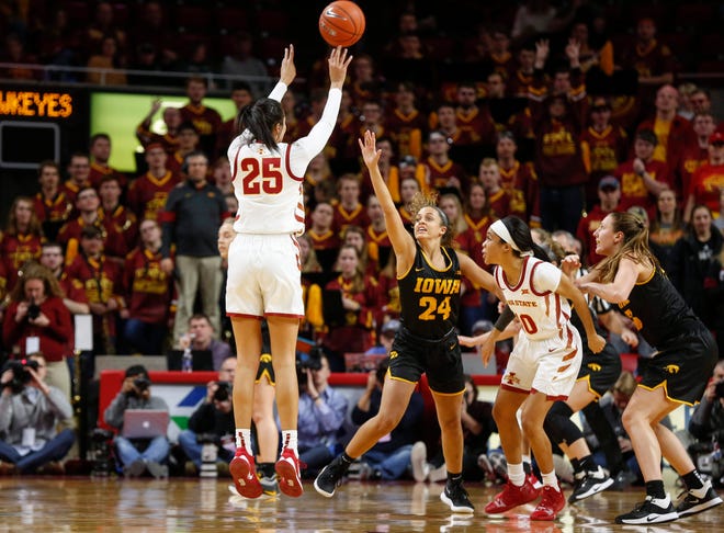 Iowa State junior Kristen Scott launches a three-pointer in the first quarter against Iowa during the CyHawk Series women's basketball game on Wednesday, Dec. 11, 2019, at Hilton Coliseum in Ames, Iowa.