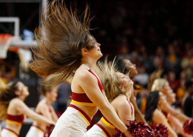 Mermbers of the Iowa State dance team perform during a break in action in the second half against Iowa in the CyHawk Series women's basketball game on Wednesday, Dec. 11, 2019, at Hilton Coliseum in Ames, Iowa.