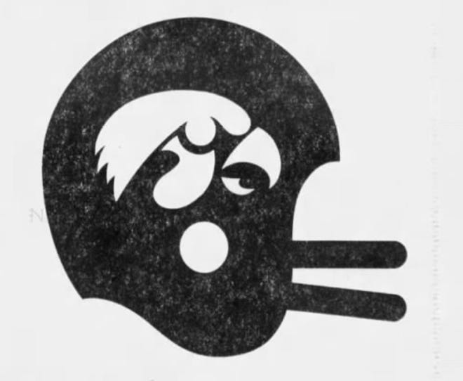 New design - Iowa's Hawkeyes will wear new headgear for the fall of 1979, black helmets with a gold stripe down the middle and a gold hawk decal on the side. The decal was created by Bill Colbert of Three Arts Design in Cedar Rapids.