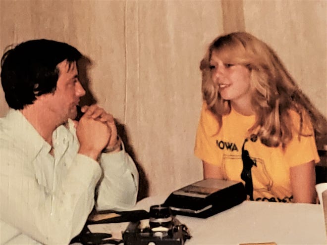Molly (Van Benthuysen) Bolin takes questions from a reporter before an Iowa Cornets game.