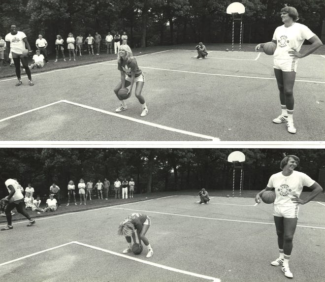 From 1980: Iowa Cornets star Molly Bolin prepares to shoot an underhand free throw, then laughs, during a game of H-O-R-S-E with former NBA star Rick Barry, right, and former Drake University basketball player Dolph Pulliam. The scene was Greenwood Park in Des Moines and the setting was a fundraiser for the Special Olympics. Bolin eventually won the game when Barry failed to match her shot from half court.