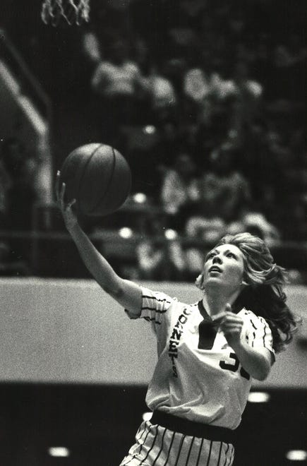 From 1979: Molly Bolin of the Iowa Cornets glides in for an easy layup.