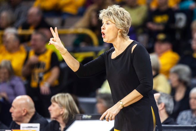 Iowa head coach Lisa Bluder gestures to players during a NCAA college Big Ten Conference women's basketball game, Thursday, Jan. 9, 2020, at Carver-Hawkeye Arena in Iowa City, Iowa.