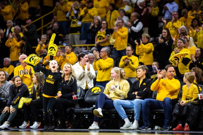 Iowa Hawkeyes fans cheer during a NCAA college Big Ten Conference women's basketball game, Thursday, Jan. 9, 2020, at Carver-Hawkeye Arena in Iowa City, Iowa.