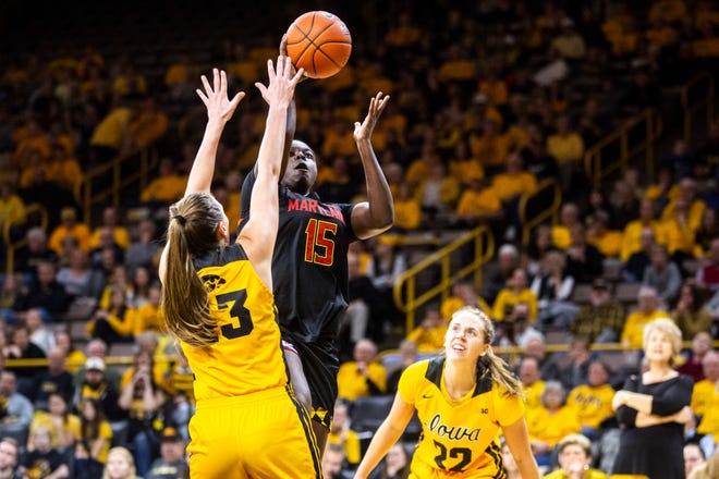 Maryland guard Ashley Owusu (15) drives to the basket as Iowa forward Amanda Ollinger, left, defends during a NCAA college Big Ten Conference women's basketball game, Thursday, Jan. 9, 2020, at Carver-Hawkeye Arena in Iowa City, Iowa.