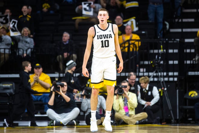 Iowa guard Joe Wieskamp (10) reacts after making a 3-point basket during a NCAA college Big Ten Conference men's basketball game, Friday, Jan. 10, 2020, at Carver-Hawkeye Arena in Iowa City, Iowa.