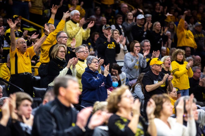 Iowa fans cheer during a NCAA Big Ten Conference women's basketball game, Sunday, Jan. 12, 2020, at Carver-Hawkeye Arena in Iowa City, Iowa.