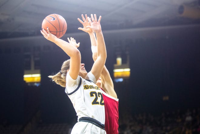 Iowa guard Kathleen Doyle (22) makes a basket during a NCAA Big Ten Conference women's basketball game against Indiana, Sunday, Jan. 12, 2020, at Carver-Hawkeye Arena in Iowa City, Iowa.