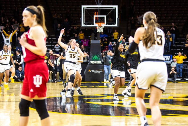 Iowa Hawkeyes players celebrate after defeating Indiana during a NCAA Big Ten Conference women's basketball game, Sunday, Jan. 12, 2020, at Carver-Hawkeye Arena in Iowa City, Iowa.
