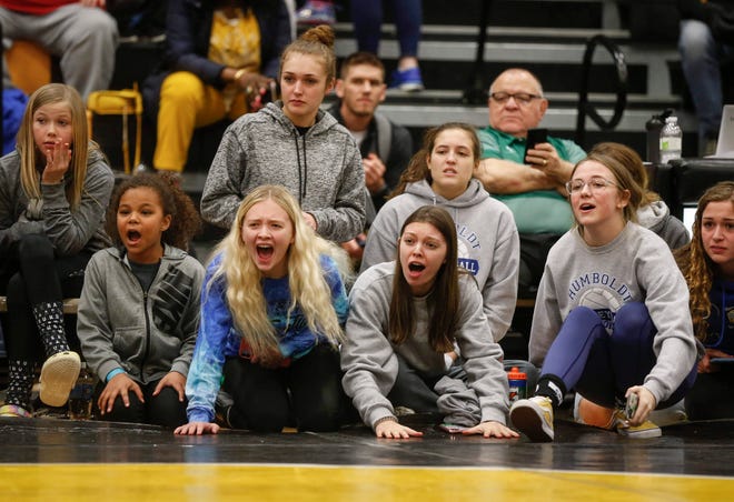 Fans cheer as Humboldt's Kendal Clark wins a state title over Independence's Kenzie Fischels at 170 pounds during the 2020 Iowa girls state wrestling tournament on Saturday, Jan. 25, 2020, at Waverly-Shell Rock High School.