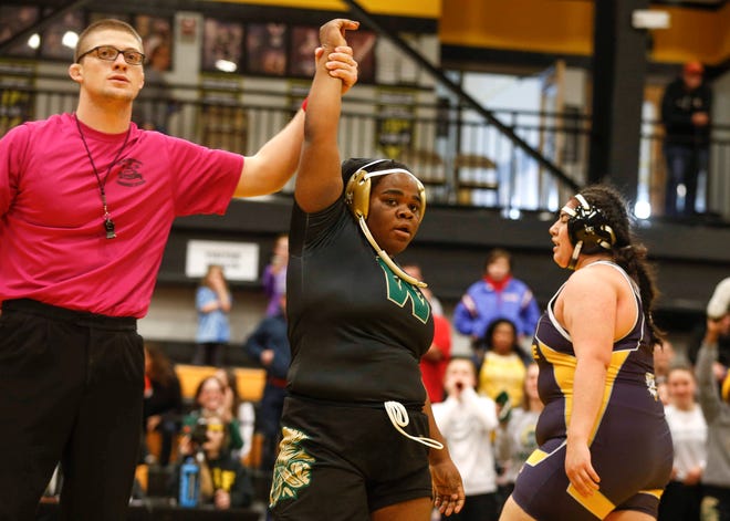 Iowa City West's Salima Omari won a state wrestling title at 285 pounds after pinning Riverside's Iliana Yanes during the 2020 Iowa girls state wrestling tournament on Saturday, Jan. 25, 2020, at Waverly-Shell Rock High School.