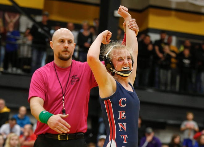 Davenport Central's Sydney Park celebrates a state title at 126 pounds during the 2020 Iowa girls state wrestling tournament on Saturday, Jan. 25, 2020, at Waverly-Shell Rock High School.