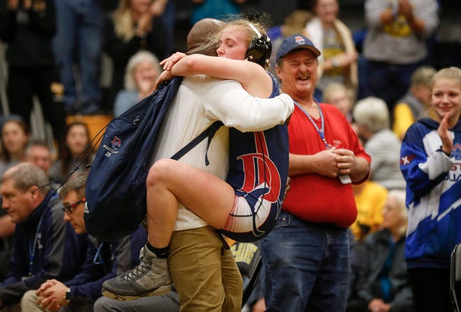 Davenport Central's Sydney Park celebrates a state title at 126 pounds during the 2020 Iowa girls state wrestling tournament on Saturday, Jan. 25, 2020, at Waverly-Shell Rock High School.