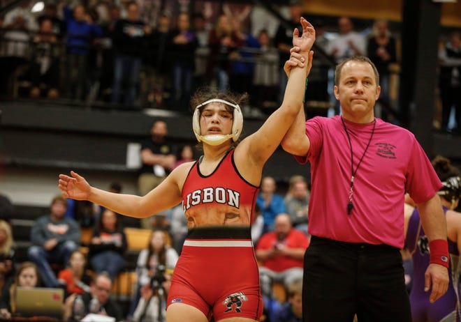 Lisbon's Jannell Avila celebrates a state title at 138 pounds  during the 2020 Iowa girls state wrestling tournament on Saturday, Jan. 25, 2020, at Waverly-Shell Rock High School.