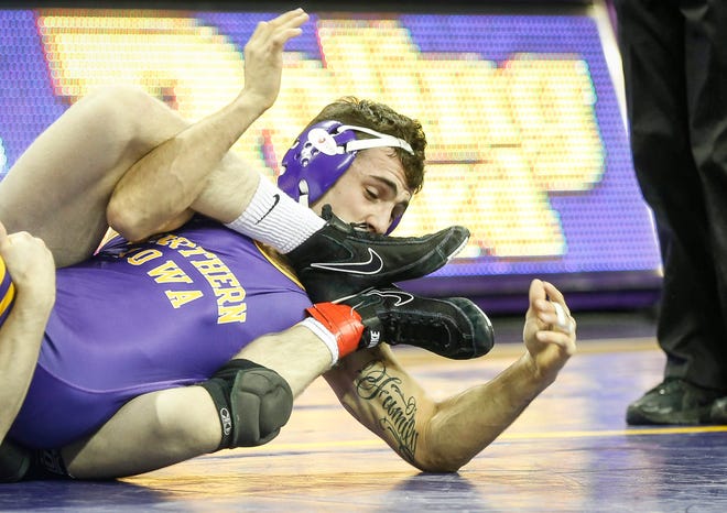 Northern Iowa's Michael Blockhus battles Oklahoma State's Dusty Hone at 141 pounds on Saturday, Jan. 25, 2020, at the McCleod Center in Cedar Falls.