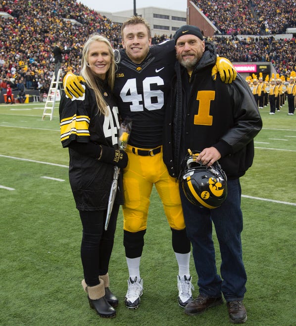 George Kittle is shown on Iowa's senior day in 2016 against Nebraska with his mom, Jan Krieger, and father, former Iowa lineman Bruce Kittle. George had two TD catches in that 40-10 Hawkeye win.