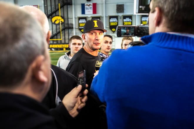 Iowa head coach Rick Heller talks with reporters during Hawkeye baseball media day, Thursday, Feb. 6, 2020, at the University of Iowa Indoor Practice Facility in Iowa City, Iowa.