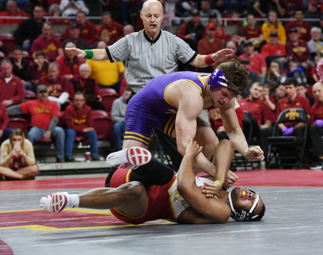 UNI’s Taylor Lujan takes down Iowa State’s Marcus Coleman during their 184-pound wrestling match at Hilton Coliseum on Sunday, Feb. 16, 2020, in Ames, Iowa.