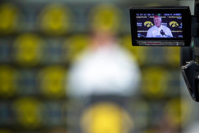 Iowa athletic director Gary Barta is seen on the screen of a television camera while he speaks during a news conference, Monday, June 15, 2020, at Carver-Hawkeye Arena in Iowa City, Iowa.