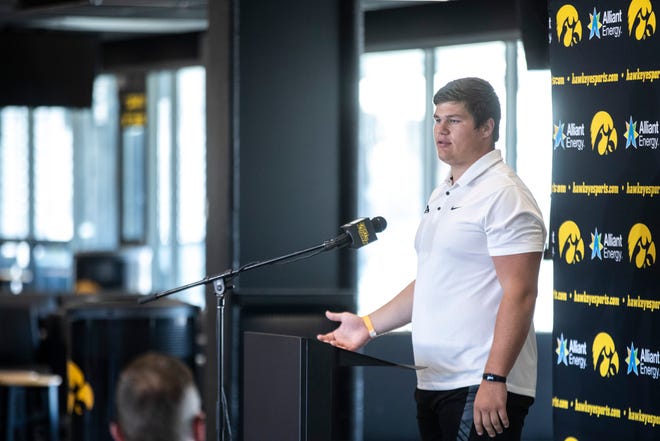Iowa center Tyler Linderbaum speaks during a news conference, Thursday, July 16, 2020, at the Pacha Family Club Room in the north end zone of Kinnick Stadium in Iowa City, Iowa.