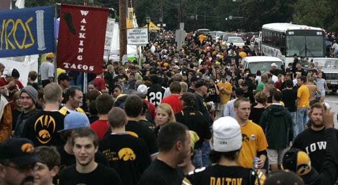 The crowds of fans and tailgaters jam Melrose Ave. south of Kinnick Stadium Saturday, Sept. 13, 2008, pregame ahead of the Iowa Hawkeyes hosting Iowa State.