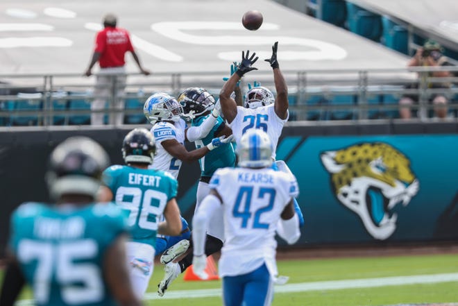 Duron Harmon (26) of the Detroit Lions intercepts a pass by Gardner Minshew (15) of the Jacksonville Jaguars (not pictured) during the second quarter of a game at TIAA Bank Field on Oct. 18, 2020, in Jacksonville, Florida.