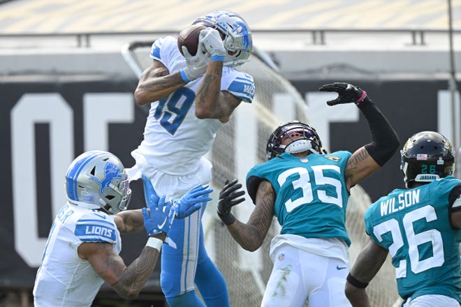 Detroit Lions wide receiver Kenny Golladay makes a catch against Jacksonville Jaguars cornerback Sidney Jones (35) during the second half Sunday, Oct. 18, 2020, in Jacksonville, Fla.