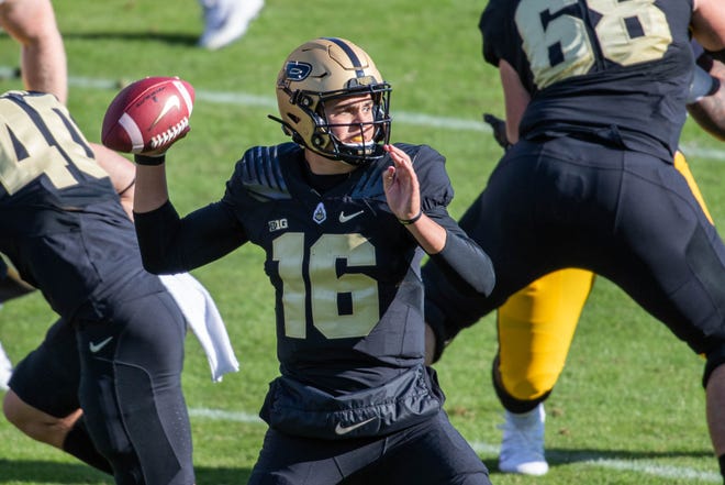 Oct 24, 2020; West Lafayette, Indiana, USA; Purdue Boilermakers quarterback Aidan O'Connell (16) passes the ball in the first quarter against the Iowa Hawkeyes at Ross-Ade Stadium. Mandatory Credit: Trevor Ruszkowski-USA TODAY Sports