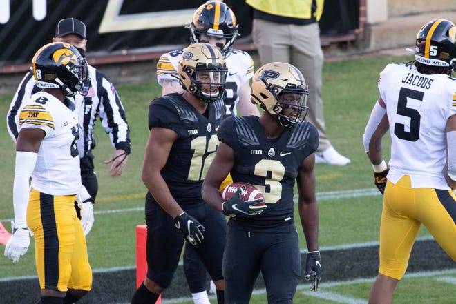 Oct 24, 2020; West Lafayette, Indiana, USA; Purdue Boilermakers wide receiver David Bell (3) celebrates his  touchdown in the second quarter against the Iowa Hawkeyes at Ross-Ade Stadium. Mandatory Credit: Trevor Ruszkowski-USA TODAY Sports