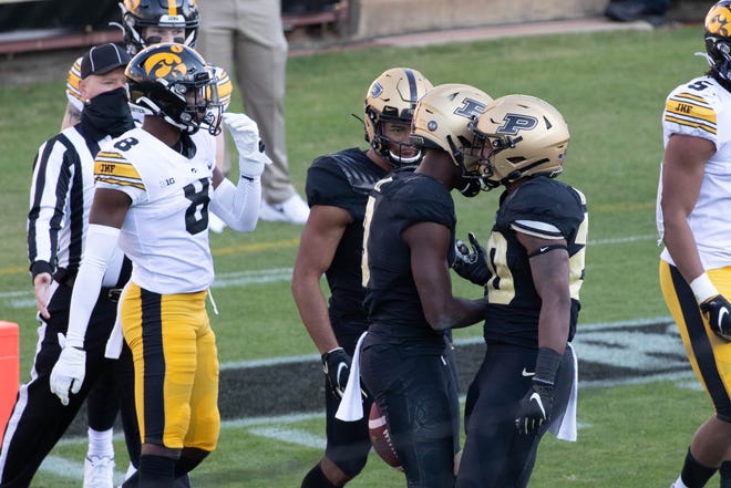 Oct 24, 2020; West Lafayette, Indiana, USA; Purdue Boilermakers wide receiver David Bell (3) celebrates his  touchdown with teammates in the second quarter against the Iowa Hawkeyes at Ross-Ade Stadium. Mandatory Credit: Trevor Ruszkowski-USA TODAY Sports