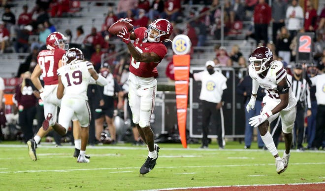 Alabama wide receiver DeVonta Smith caught 11 passes for 203 yards and four touchdowns as Alabama hammered Mississippi State.