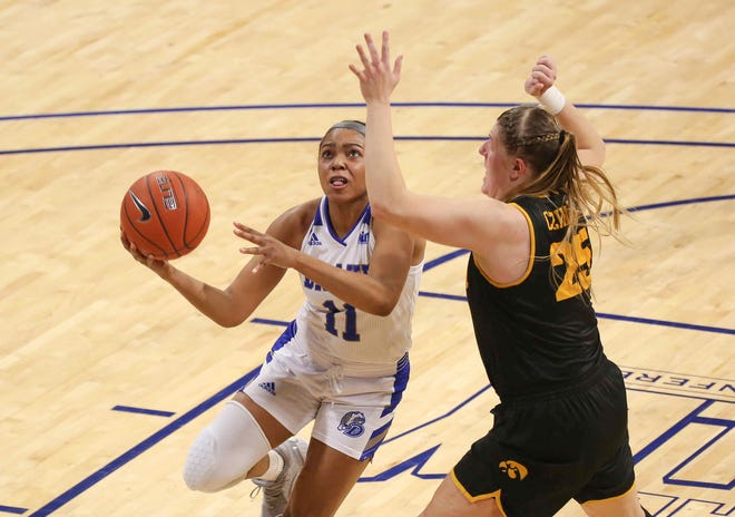 Drake's Kierra Collier drives the ball to the basket in the fourth quarter against Iowa at the Knapp Center in Des Moines on Wednesday, Dec. 2, 2020.