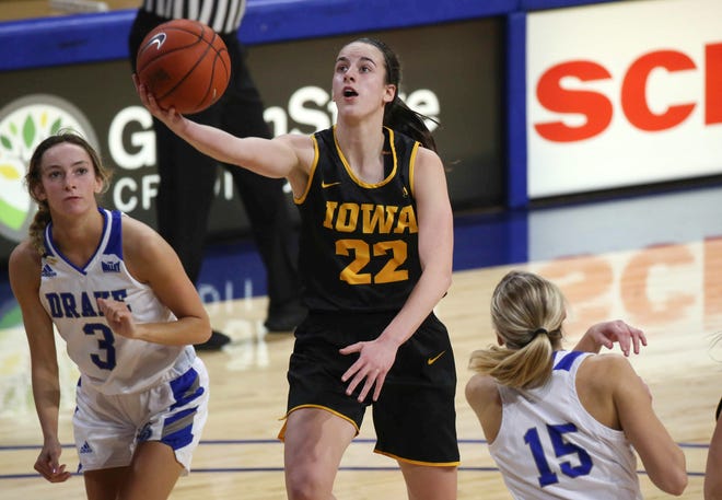 Iowa guard Caitlin Clark puts in a layup in the second quarter against Drake at the Knapp Center in Des Moines on Wednesday, Dec. 2, 2020.