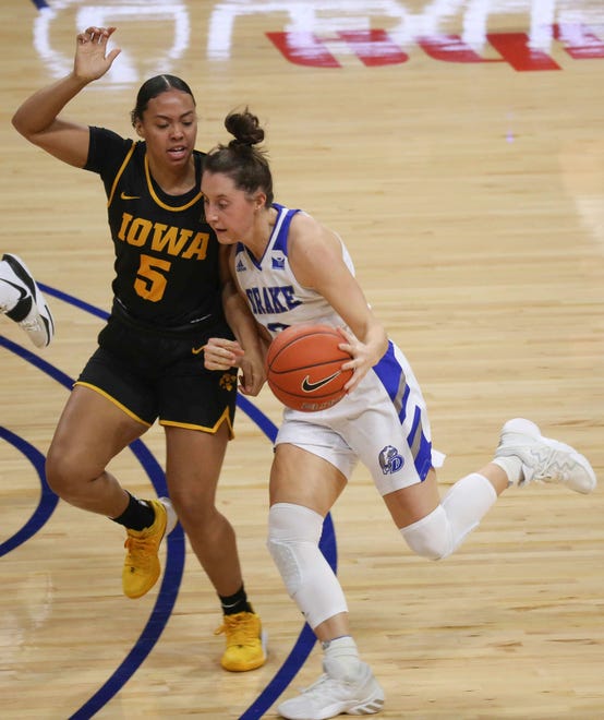 Drake guard Maddie Monahan runs the ball up the court in the first quarter against Iowa's Alexis Sevillian at the Knapp Center in Des Moines on Wednesday, Dec. 2, 2020.