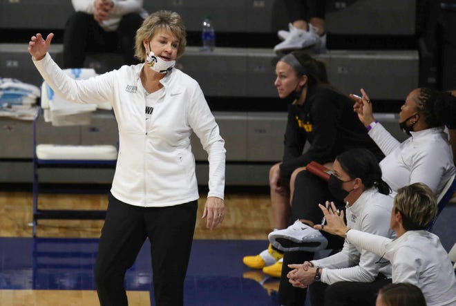 Iowa head women's basketball coach Lisa Bluder reacts to a foul call against her Hawkeyes in the second quarter against Drake at the Knapp Center in Des Moines on Wednesday, Dec. 2, 2020.