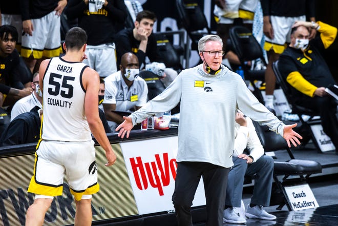 Iowa head coach Fran McCaffery reacts as Iowa center Luka Garza (55) heads to the bench with his third foul during a NCAA Big Ten Conference men's basketball game against Purdue, Tuesday, Dec. 22, 2020, at Carver-Hawkeye Arena in Iowa City, Iowa.