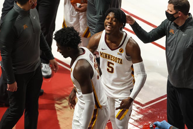 Dec 25, 2020; Minneapolis, Minnesota, USA; Minnesota Gophers guard Marcus Carr (5) reacts after their win against the Iowa Hawkeyes in overtime at Williams Arena. Mandatory Credit: Harrison Barden-USA TODAY Sports