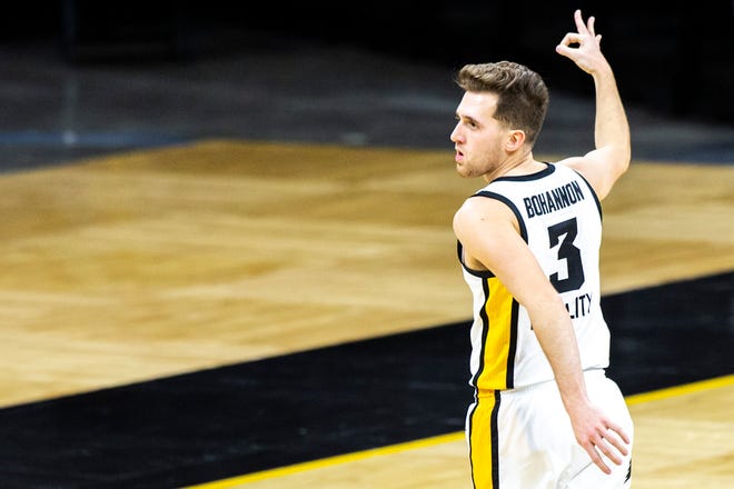 Iowa guard Jordan Bohannon (3) reacts after making a 3-point basket during a NCAA Big Ten Conference men's basketball game, Tuesday, Dec. 29, 2020, at Carver-Hawkeye Arena in Iowa City, Iowa.