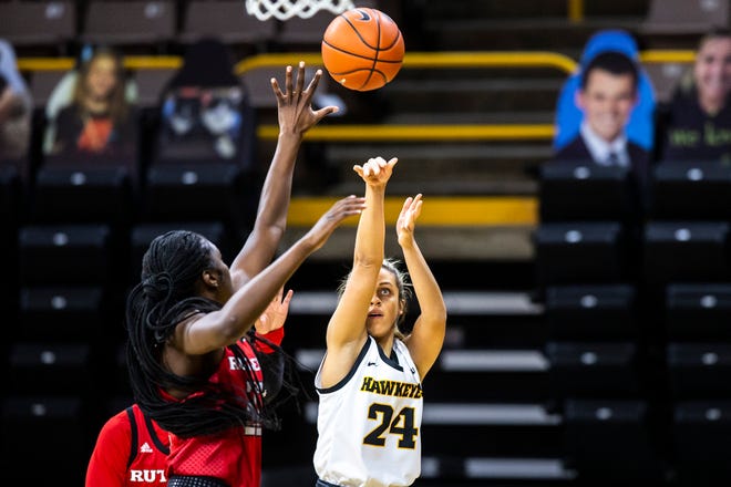 Iowa guard Gabbie Marshall (24) makes a basket during a NCAA Big Ten Conference women's basketball game against Rutgers, Thursday, Dec. 31, 2020, at Carver-Hawkeye Arena in Iowa City, Iowa.